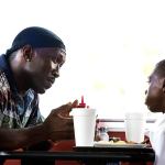 This image shows Mahershala Ali and Alex Hibbert in a scene from &ldquo;Moonlight.&rdquo; (David Bornfriend/A24 via AP)