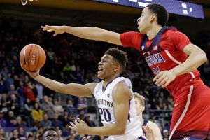 Huskies battle in home finale, fall to No. 5 Arizona 76-68