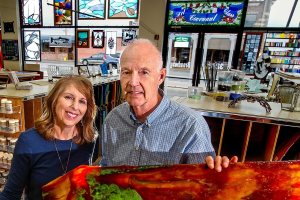 Covenant Art Glass owners, Colleen and Stan Price have a lot to smile about these days, including the biggest selection of art glass they&rsquo;ve ever had. (Dan Bates / The Herald)