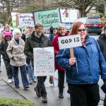 Few dozen march in Everett to support immigrants, refugees