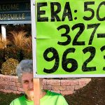 Mary Whitmore, who worked for ratification of the Equal Rights Amendment in the 1970s and &rsquo;80s, holds a sign to demonstrate her support of a new push for the ERA last weekend in Coupeville. The amendment fell short of ratification, by three states, before a 1982 deadline. Whitmore is heading a new Island County Democrats ERA committee. (Courtesy Mary Whitmore)