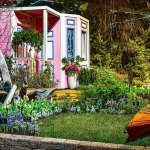 &ldquo;From Sea to Shining Sea – Coupeville, Washington&rdquo; is the title of this display garden from the 2016 show by Fancy Plants Gardens, Inc., in Bothell. Colorful and slightly quirky, travelers make their way to this seaside town to enjoy the spectacular natural saltwater setting. A destination for many for generations, Coupeville&rsquo;s historic Blue Goose Inn Bed & Breakfast is depicted here, including its eye-catching pink-with-blue-trim exterior. Oysters, crabs and a kayak, symbolizing the ties this town has to Puget Sound, are found throughout the landscape. Metal sculptures &mdash; herons, bear, a moose and more &mdash; accentuate the Northwest flavor of Coupeville. (Northwest Flower & Garden Show)