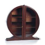 This unusual round cabinet was made to hold a collection of curios or china. It was sold at a Garth&rsquo;s in Ohio auction for $450.