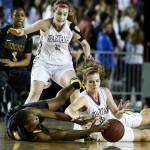 Stanwood&rsquo;s Ashley Alter (right) and Lincoln&rsquo;s Kondalia Montgomery (left) battle for a loose ball during a girls 3A state quarterfinal game at the Tacoma Dome on Thursday, March 2. Lincoln went on to defeat Stanwood 53-37. (Ian Terry / The Herald)