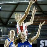 Snohomish&rsquo;s Kyra Beckman (top) skies above Seattle Prep defenders Marie Hauck (left) and Bea Franklin during a girls 3A state quarterfinal game on March 2, 2017, at the Tacoma Dome. Snohomish won 53-36. (Ian Terry / The Herald)