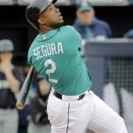 Seattle&rsquo;s Jean Segura bats during the second inning of a spring training game Feb. 27 in Peoria, Ariz. (AP Photo/Charlie Riedel)
