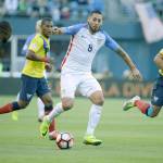Clint Dempsey (center) controls the ball as he dribbles between Ecuador&rsquo;s Christian Noboa (right) and Walter Ayovi during a Copa America Centenario quarterfinal on June 16 in Seattle. Dempsey was recalled to Team USA by new coach Bruce Arena on Wednesday. (AP Photo/Elaine Thompson)