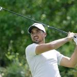 Jason Day watches his tee shot on the sixth hole against Pat Perez during round-robin play at the Match Play tournament at Austin County Club, Wednesday in Austin, Texas. Day conceded the match after this hole and withdrew from the tournament. (AP Photo/Eric Gay)