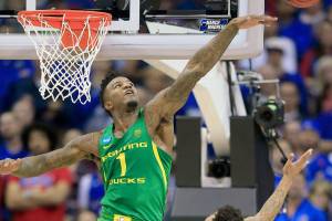 Oregon beats Kansas 74-60 to punch Final Four ticket