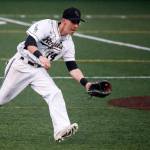 Lynnwood shortstop Kyler McMahan fields a ground ball on the run during a game against Snohomish on march 28, 2017, at Mountlake Terrace High School. (Ian Terry / The Herald)