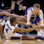 Gonzaga guard Jordan Mathews (4) passes the ball as South Dakota State&rsquo;s Tevin King (left) and Lane Severyn defend during the first half of a first-round men&rsquo;s college basketball game in the NCAA Tournament on Thursday in Salt Lake City. (AP Photo/Rick Bowmer)