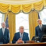 President Donald Trump, flanked by Health and Human Services Secretary Tom Price (left) and Vice President Mike Pence, meets with members of the media regarding the health care overhaul bill on Friday in the Oval Office of the White House in Washington. (AP Photo/Pablo Martinez Monsivais)