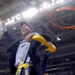 Gonzaga head coach Mark Few celebrates after cutting down the net following his team&rsquo;s 83-59 win over Xavier on Saturday in the NCAA West Regional in San Jose, California. (AP Photo/Tony Avelar)