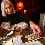 Everett&rsquo;s Lorna Donadio, 77, has been collecting old photos she finds at garage sales, some dating back as far as 1911. As time passes, she wants them to have a home. (Dan Bates / The Herald)