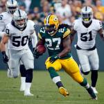 In this Aug. 18, 2016, file photo, Green Bay Packers running back Eddie Lacy rushes against the Oakland Raiders during the first half of a preseason game in Green Bay. (AP Photo/Mike Roemer, File)