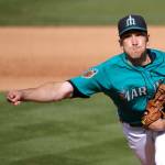 Seattle Mariners pitcher Pat Venditte throws during the seventh inning of a spring-training game against the San Diego Padres on Feb. 26, 2017, in Peoria, Arizona. The Mariners traded Venditte to Philadelphia on Sunday. (AP Photo/Charlie Riedel)