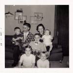 The Wiggums in their Oaks street home in 1956. Arnie Wiggum holds Paulin his lap as Irene holds Dave. In the middle is the oldest, Matt, lower left is sister Jan (Morberg) and lower right is sister Chris (Alexander). (Photo courtesy the Wiggum family)
