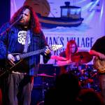Kirk Rutherford (left) sings during a set of music from the Everett band The Moon Is Flat at Tony V&rsquo;s during the opening night of the Fisherman&rsquo;s Village Music Festival in Everett on Friday, March 31. (Ian Terry / The Herald)