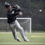 Lynnwood shortstop Kyler McMahan makes an on-the-run throw to first base during a team practice at Scriber Lake High School on March 14, 2017. McMahan is an Oregon State University signee and was recently listed as one of the country&rsquo;s top 100 high school baseball prospects. (Ian Terry / The Herald)