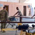 Engineer soldiers of the 176th Engineer Company, 863rd Engineer Battalion, 176th Engineer Brigade construct offices for incoming flight line personnel in a remote Iraq camp. The unit recently completed a nine-month deployment. (U.S. Army Photo by Spc. Valentina Aguilar)