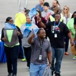 Boeing employees carry 787-10 Dreamliner flags during the first flight ceremony Friday. (AP Photo/Mic Smith)