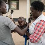 A mother (left) takes her son after he was weighed and found to be suffering from severe acute malnutrition at Al Sabbah Children&rsquo;s Hospital in Juba, South Sudan. (Mackenzie Knowles-Coursin/UNICEF via AP)