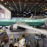 In this Feb. 13 photo, the first of the large Boeing 737 MAX 9 models, expected to begin test flights in April, sits at the front of the assembly line and almost ready to roll out at the company&rsquo;s airplane production facility in Renton. (AP Photo/Elaine Thompson, File)