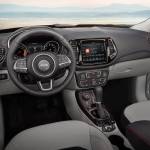 A new, fourth-generation version of Jeep&rsquo;s Uconnect infotainment system highlights the 2017 Compass&rsquo; interior. (Manufacturer photo)