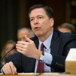 FBI Director James Comey testifies on Capitol Hill in Washington on Jan. 10. (AP Photo/Cliff Owen, File)