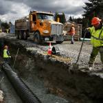 Crews worked on a temporary bypass pipeline Feb. 23 near Lake Serene&rsquo;s public boat launch in Lynnwood. (Ian Terry / Herald file)