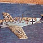 A Messerschmitt Bf 109 fighter flies near the North African coast in 1941. (Wikipedia)