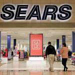 Shoppers walk into a Sears store in Pittsburgh recently. (AP Photo/Gene J. Puskar, File)