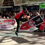 Clint Hartman, a sign spinner from Portland, Ore., performs a routine in downtown Las Vegas during the annual World Sign Spinning Championships. In multiple heats with rap, hip-hop and pop tunes blasting, more than 100 competitors twirled the arrow-shaped sign in front of a cheering crowd. (AP Photo/Regina Garcia Cano)
