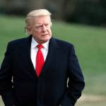 Returning from a trip to his Mar-a-Lago estate in Palm Beach, Florida, President Donald Trump walks to the White House after arriving on Marine One on Sunday. (AP Photo/Alex Brandon)
