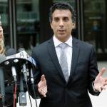 Plaintiff attorney Jason Forge (center) speaks alongside attorney Rachel Jensen after a hearing for a lawsuit against President Donald Trump on Thursday, March 30 in San Diego. (AP Photo/Gregory Bull)