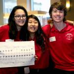 Eisenhower Middle School students Chenda Larsen, Celine Nguyen and Max White served as greeters at the Everett Public Schools Foundation&rsquo;s annual Benefit Breakfast on March 8, 2017. (Contributed photo)