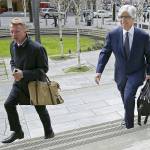 Mark Rosenbaum (right), an attorney for Daniel Ramirez Medina, arrives at the federal courthouse in Seattle on Wednesday, March 8, for a hearing for Medina, a Seattle-area man who was arrested and detained by immigration agents despite his participation in a federal program to protect those brought to the U.S. illegally as children. (AP Photo/Ted S. Warren)