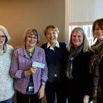 Representatives of Guild 20 present a check to Providence General Children&rsquo;s Association President Mary Lou Finley, representing proceeds from their annual holiday poinsettia sale. (Contributed photo)