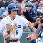 Drew Jackson makes his way to the dugout after the scoring for the AquaSox during a game against the Emeralds on June 18, 2015 in Everett. (Kevin Clark / The Herald)