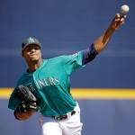 Mariners starting pitcher Ariel Miranda throws during the first inning of a game against the Brewers on March 2, 2017, in Peoria, Ariz. (AP Photo/Charlie Riedel)