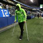 Injured Seahawks free safety Earl Thomas walks off the field late in the first half of a playoff game against the Lions on Jan. 7, 2017, in Seattle. (AP Photo/Elaine Thompson)