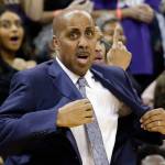 Washington head coach Lorenzo Romar pulls on his jacket as a call goes in favor of Arizona late in the second half of a game Feb. 18, 2017, in Seattle. Arizona won 76-68. (AP Photo/Elaine Thompson)