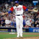 Puerto Rico pitcher, and Mariners closer, Edwin Diaz reacts after getting the last out to defeat the Dominican Republic in a second-round World Baseball Classic game March 14, 2017, in San Diego. Puerto Rico won 3-1. (AP Photo/Gregory Bull)