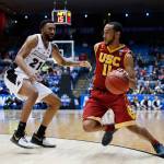Southern California&rsquo;s Jordan McLaughlin (11) drives against Providence&rsquo;s Jalen Lindsey (21) during the second half of a First Four game of the NCAA tournament March 15, 2017, in Dayton, Ohio. Southern California won 75-71. (AP Photo/John Minchillo)