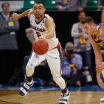 Gonzaga guard Nigel Williams-Goss (5) moves the ball down court after stealing it from South Dakota State forward Mike Daum (right) during the first half of an NCAA Tournament game March 16, 2017, in Salt Lake City. (AP Photo/George Frey)