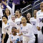 Players on the Washington bench cheer a score against Montana State during the first half of an NCAA Tournament game March 18, 2017, in Seattle. (AP Photo/Elaine Thompson)
