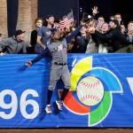 U.S. outfielder Adam Jones robs a home run from the Dominican Republic&rsquo;s Manny Machado during the seventh inning of a World Baseball Classic game on March 18, 2017, in San Diego. (AP Photo/Gregory Bull)