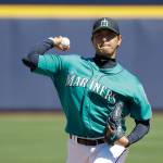 Mariners pitcher Hisashi Iwakuma throws during the first inning of a spring training game against the Giants on March 18, 2017, in Peoria, Ariz. (AP Photo/Darron Cummings)