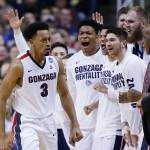 Gonzaga forward Johnathan Williams (3) celebrates with teammates after dunking against Xavier during the second half of an Elite Eight game on March 25, 2017, in San Jose, Calif. (AP Photo/Tony Avelar)