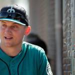 Mariners third baseman Kyle Seager watches batting practice during spring training on Feb. 21, 2017, in Peoria, Ariz. (AP Photo/Charlie Riedel)
